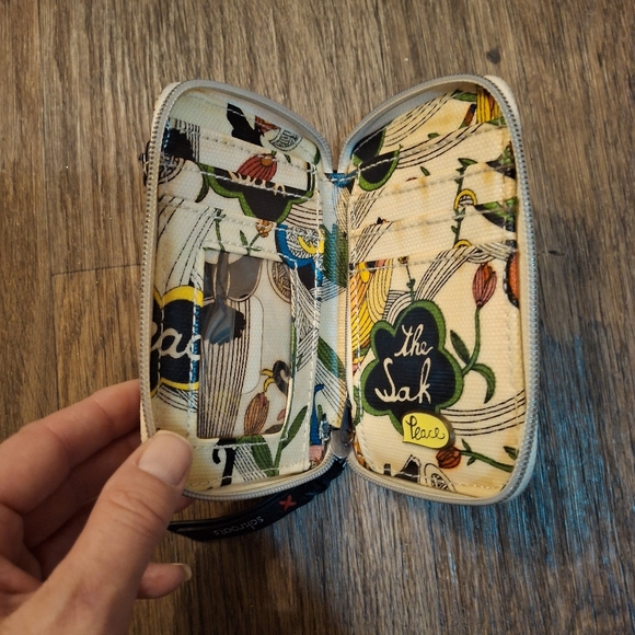 The Sakroots Peace Crossbody Wallet. - Picture 7 of 15